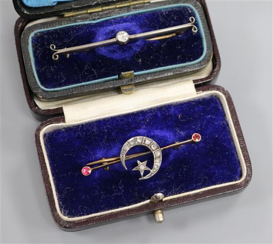 Two early 20th century yellow metal and diamond set bar brooches including crescent and star.
